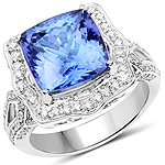 6.89 ctw. Genuine Tanzanite and 0.64 ctw. White Diamond Halo Ring in 14K White Gold